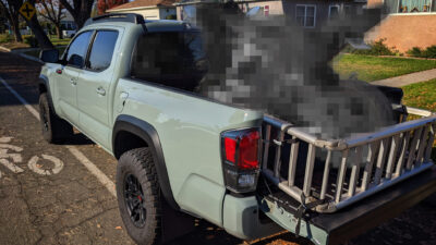 Mystery Motorcycle in the back of a Toyota Tacoma Picup